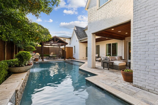 6622 Blue Valley Ln, Dallas, TX 75214 - view of pool featuring a patio area, a gazebo, a fenced backyard, an outdoor living space, and a fenced in pool