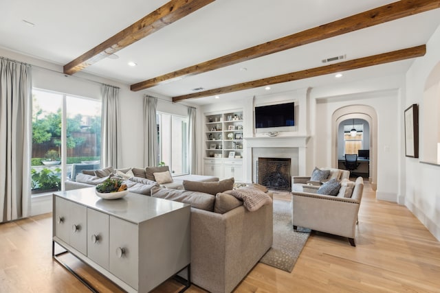 6622 Blue Valley Ln, Dallas, TX 75214 - living area featuring light wood-type flooring, a fireplace, visible vents, and recessed lighting