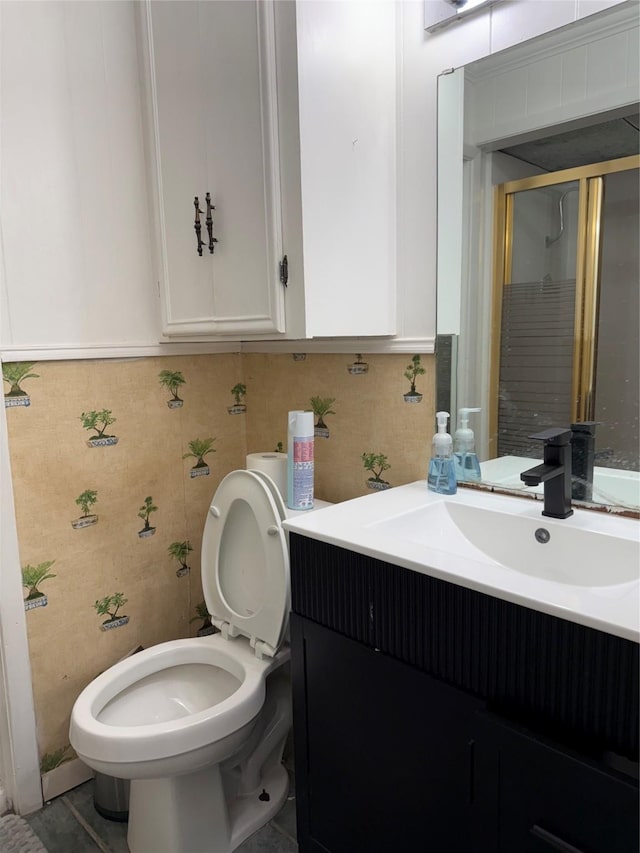 bathroom with tasteful backsplash, vanity, and toilet