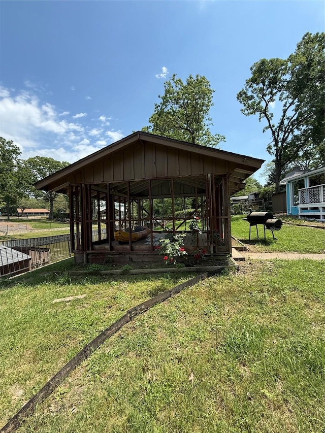 view of community featuring a yard