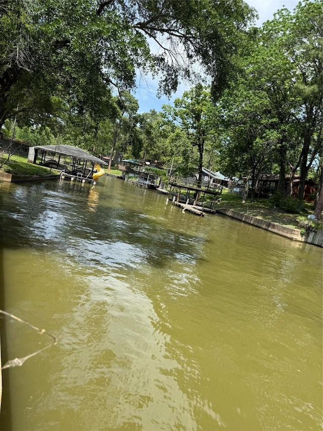 water view with a dock and boat lift