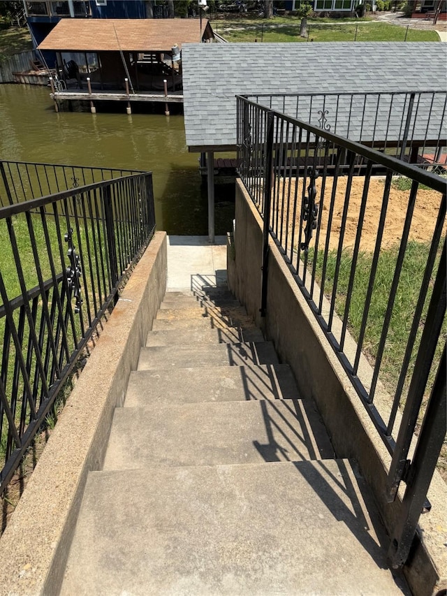 exterior space with a water view