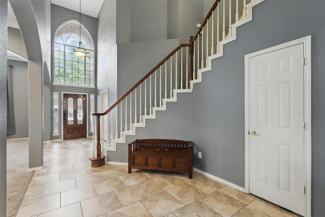 805 Red Oak Ct, Crowley, TX 76036 - foyer entrance with a towering ceiling, baseboards, and stairway