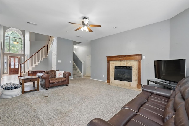 805 Red Oak Ct, Crowley, TX 76036 - carpeted living room with stairway, a ceiling fan, a tile fireplace, and baseboards