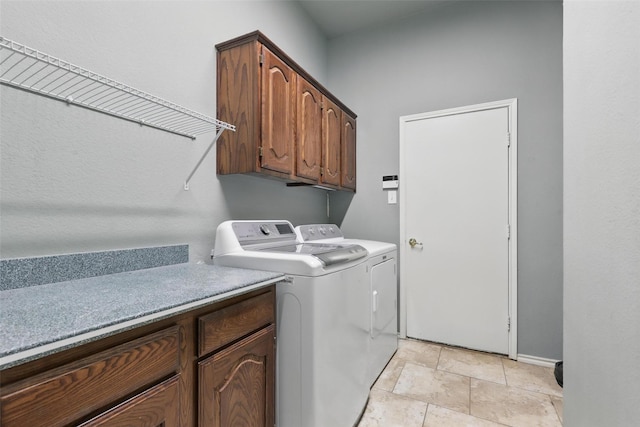 805 Red Oak Ct, Crowley, TX 76036 - clothes washing area featuring independent washer and dryer, cabinet space, and baseboards