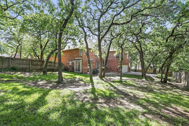 805 Red Oak Ct, Crowley, TX 76036 - view of yard featuring a garage