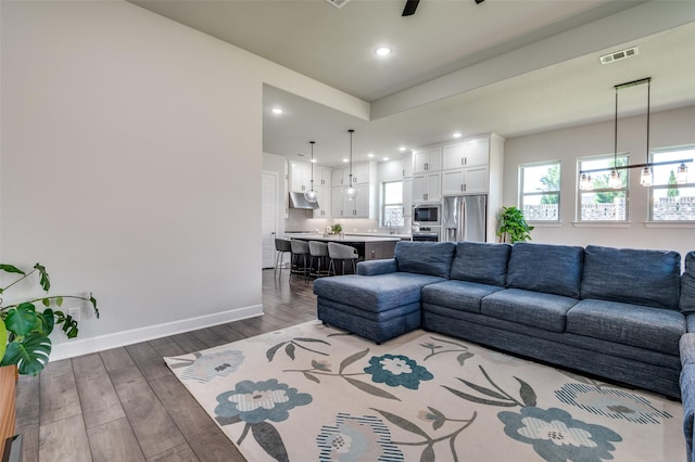 3128 Lexington Dr, Celina, TX 75009 - living room featuring wood finished floors, recessed lighting, and a ceiling fan