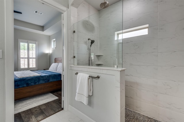 3128 Lexington Dr, Celina, TX 75009 - ensuite bathroom with walk in shower and marble look tiles