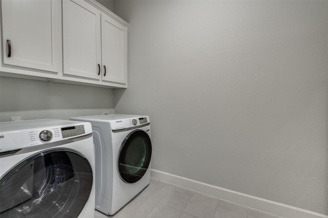3128 Lexington Dr, Celina, TX 75009 - washroom with washer and dryer and cabinet space