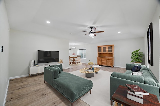 3638 Parkmont St, Mesquite, TX 75150 - living room featuring light wood-style floors, baseboards, ceiling fan, and recessed lighting