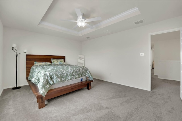 1335 Panorama Dr, Forney, TX 75126 - carpeted bedroom featuring ceiling fan, baseboards, a tray ceiling, and visible vents