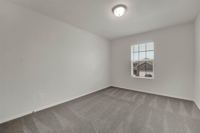 1335 Panorama Dr, Forney, TX 75126 - spare room with baseboards and dark colored carpet