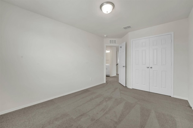 1335 Panorama Dr, Forney, TX 75126 - unfurnished bedroom with baseboards, visible vents, carpet, and a closet