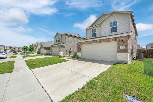1335 Panorama Dr, Forney, TX 75126 - view of front of property featuring a garage, brick siding, cooling unit, and concrete driveway
