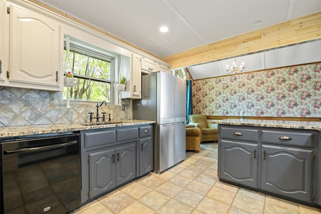 6 Broadmoor Way, Lucas, TX 75098 - kitchen with black dishwasher, freestanding refrigerator, wallpapered walls, gray cabinetry, and a sink