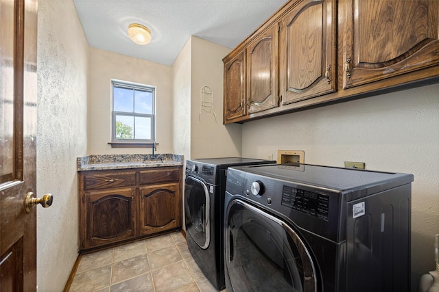 6 Broadmoor Way, Lucas, TX 75098 - laundry area with cabinet space, washing machine and clothes dryer, and a textured wall