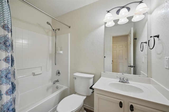 bathroom with vanity, a textured wall, toilet, and shower / bathtub combination with curtain