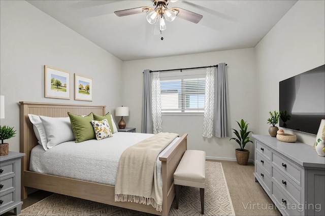 bedroom featuring baseboards and ceiling fan
