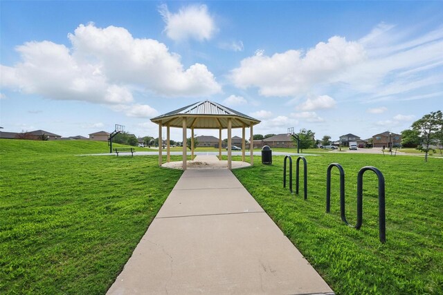 view of community with a gazebo and a yard