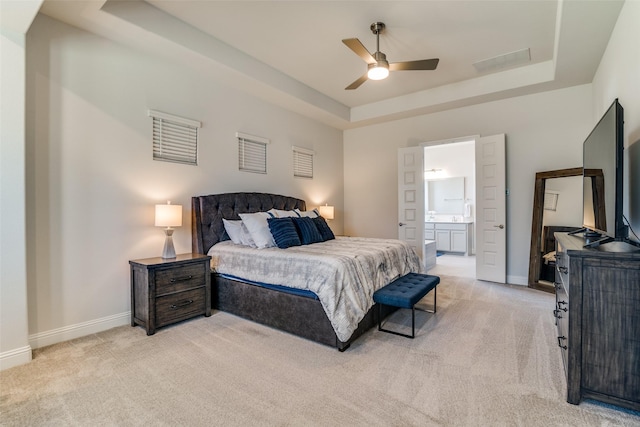 1314 Middleton Dr, Rockwall, TX 75087 - bedroom featuring visible vents, baseboards, a raised ceiling, and light colored carpet
