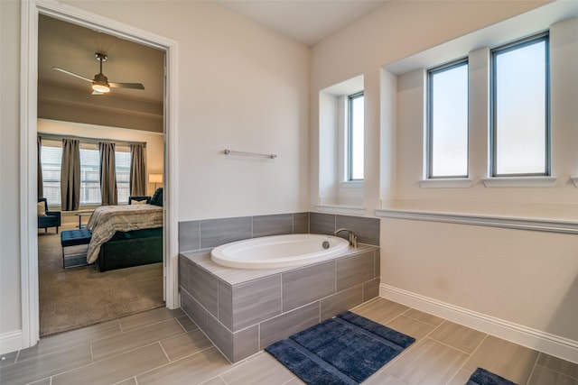 1314 Middleton Dr, Rockwall, TX 75087 - bathroom with a bath, baseboards, a ceiling fan, connected bathroom, and wood finish floors