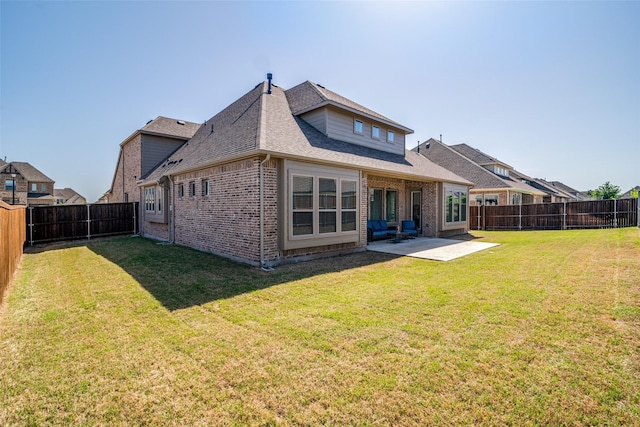 1314 Middleton Dr, Rockwall, TX 75087 - rear view of property featuring a patio, a fenced backyard, a lawn, and brick siding