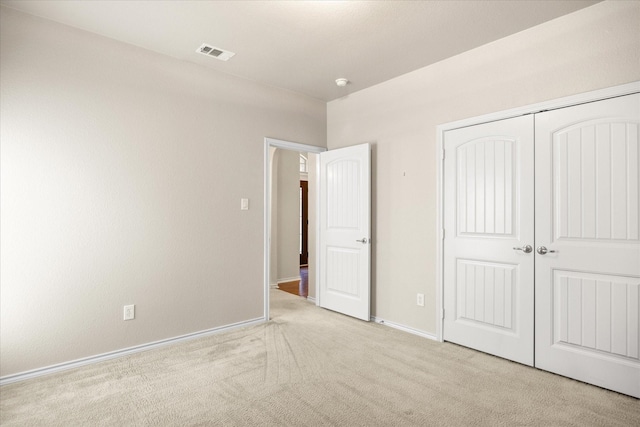 1509 Salado Trl, Weatherford, TX 76087 - unfurnished bedroom featuring visible vents, baseboards, carpet floors, and a closet