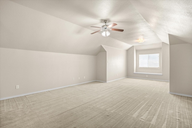 1509 Salado Trl, Weatherford, TX 76087 - bonus room featuring a ceiling fan, baseboards, light carpet, and lofted ceiling