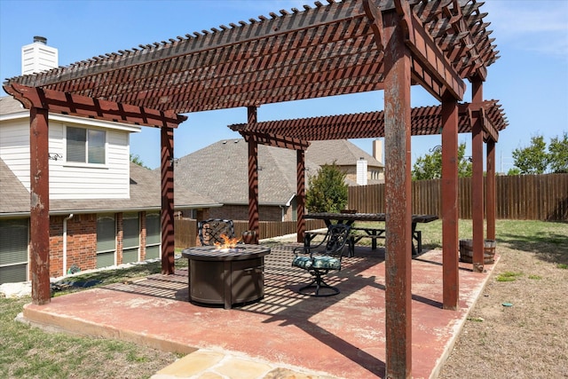 1509 Salado Trl, Weatherford, TX 76087 - view of patio with a pergola, fence, and an outdoor fire pit