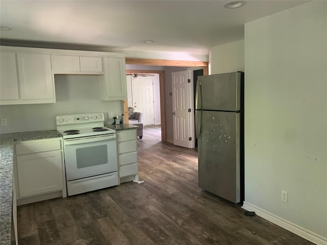 kitchen with freestanding refrigerator, white cabinets, white range with electric stovetop, dark wood-style flooring, and baseboards