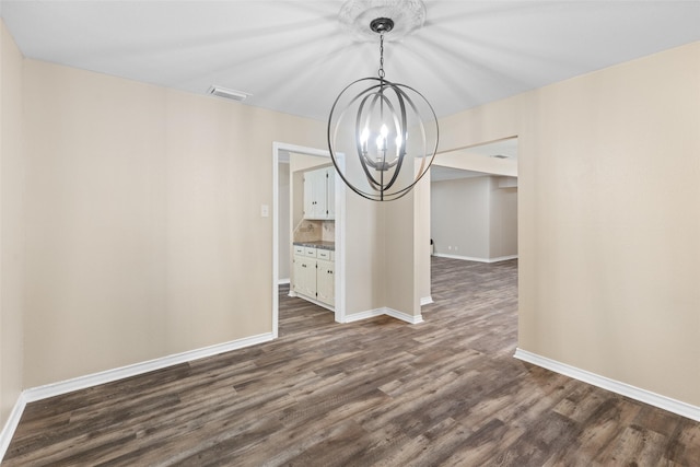 800 Western Hills Dr, Sherman, TX 75092 - unfurnished dining area with baseboards, a notable chandelier, dark wood-style floors, and visible vents