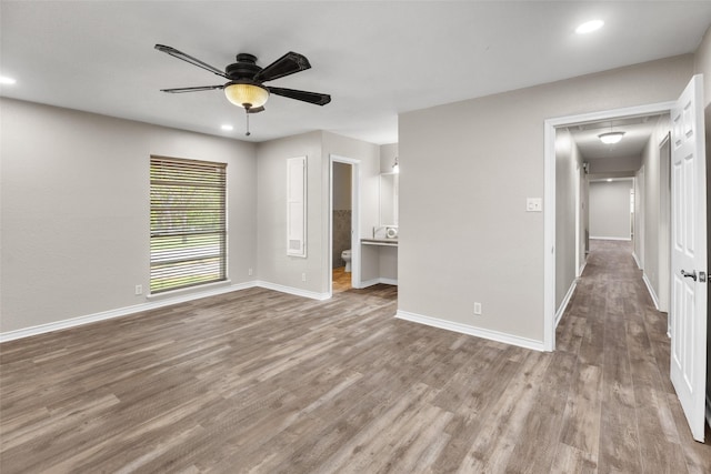 800 Western Hills Dr, Sherman, TX 75092 - unfurnished room featuring wood finished floors, baseboards, a ceiling fan, and recessed lighting