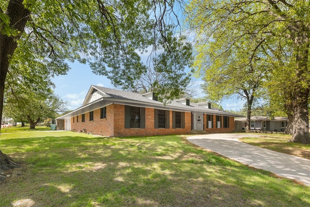 800 Western Hills Dr, Sherman, TX 75092 - view of front of home with a front lawn and brick siding