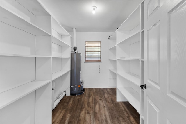 800 Western Hills Dr, Sherman, TX 75092 - spacious closet with dark wood-style floors and water heater