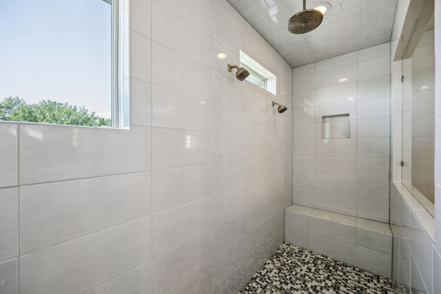 3912 Holland Ave, Dallas, TX 75219 - full bathroom featuring tiled shower