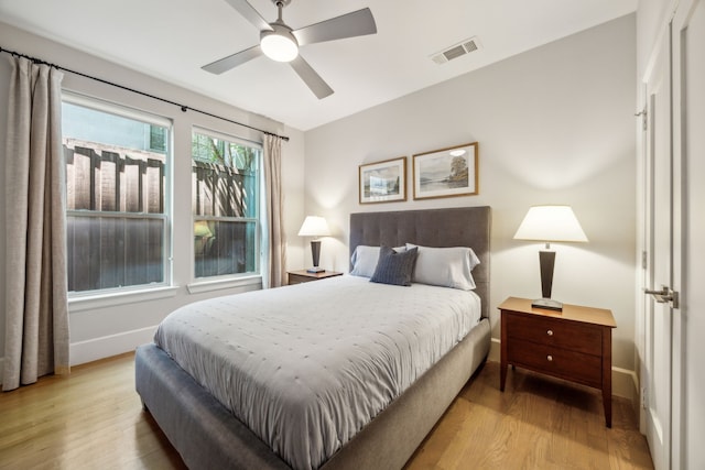 3912 Holland Ave, Dallas, TX 75219 - bedroom with light wood-style floors, baseboards, and ceiling fan