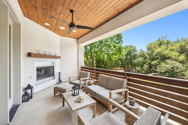 3912 Holland Ave, Dallas, TX 75219 - view of patio / terrace featuring an outdoor living space with a fireplace and a ceiling fan