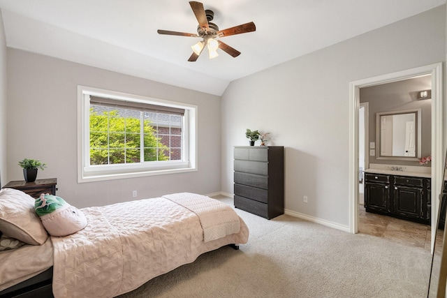 5800 Edgewood Dr, Mckinney, TX 75072 - bedroom with a sink, connected bathroom, light carpet, baseboards, and lofted ceiling