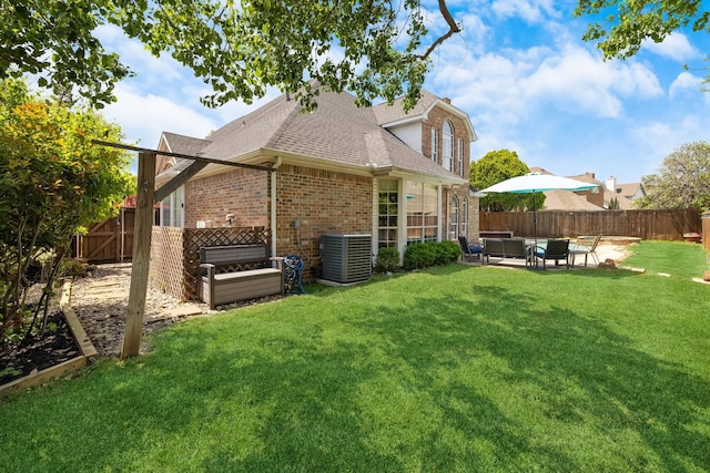 5800 Edgewood Dr, Mckinney, TX 75072 - rear view of property with brick siding, an outdoor hangout area, a fenced backyard, and central AC unit