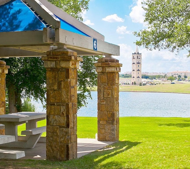 5800 Edgewood Dr, Mckinney, TX 75072 - surrounding community with a lawn and a water view