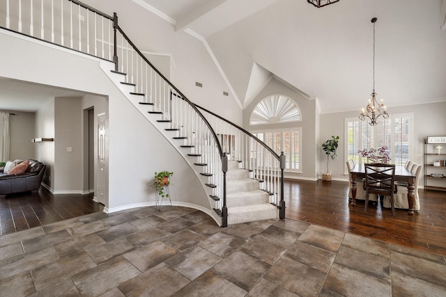 5800 Edgewood Dr, Mckinney, TX 75072 - entrance foyer featuring high vaulted ceiling, baseboards, an inviting chandelier, and stairs