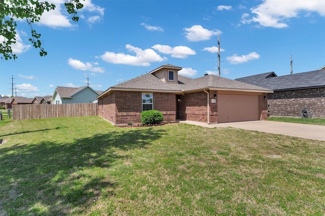 view of front of home with a front yard, an attached garage, fence, brick siding, and driveway