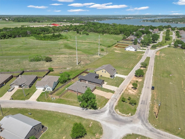 bird's eye view with a residential view and a water view