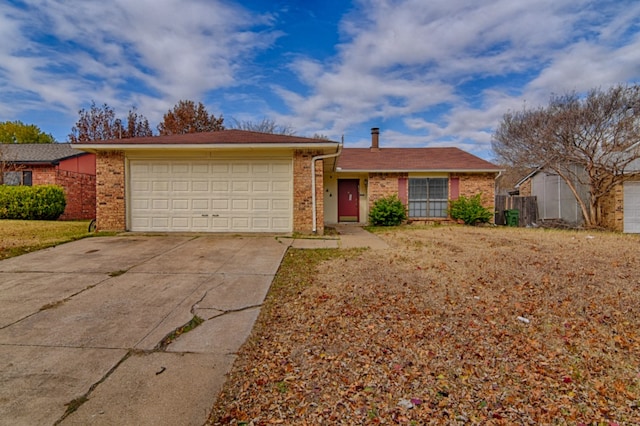 single story home with an attached garage, concrete driveway, and brick siding