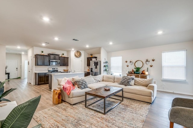 6427 Whitecap Dr, Princeton, TX 75407 - living room with recessed lighting, light wood-type flooring, and baseboards