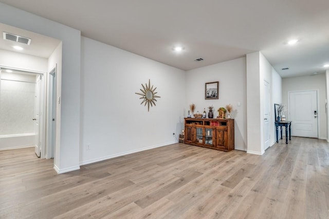6427 Whitecap Dr, Princeton, TX 75407 - unfurnished room with light wood-style floors, baseboards, and recessed lighting
