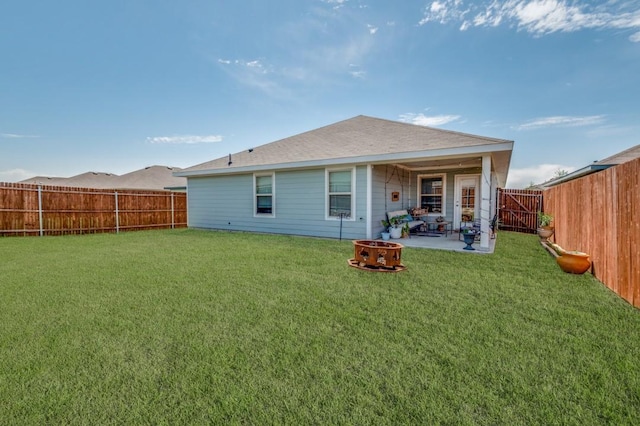 6427 Whitecap Dr, Princeton, TX 75407 - rear view of house with an outdoor fire pit and a patio