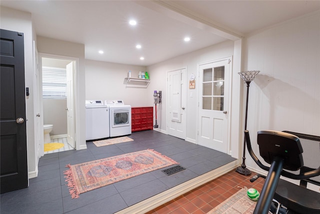 1711 Tamarack Dr, Dallas, TX 75228 - laundry room with independent washer and dryer, recessed lighting, dark tile patterned flooring, and baseboards