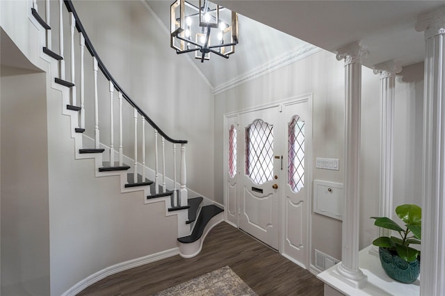 1711 Tamarack Dr, Dallas, TX 75228 - foyer entrance with baseboards, dark wood-style flooring, stairs, a chandelier, and decorative columns