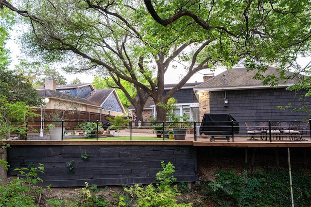 1711 Tamarack Dr, Dallas, TX 75228 - rear view of house featuring a deck and a fenced backyard